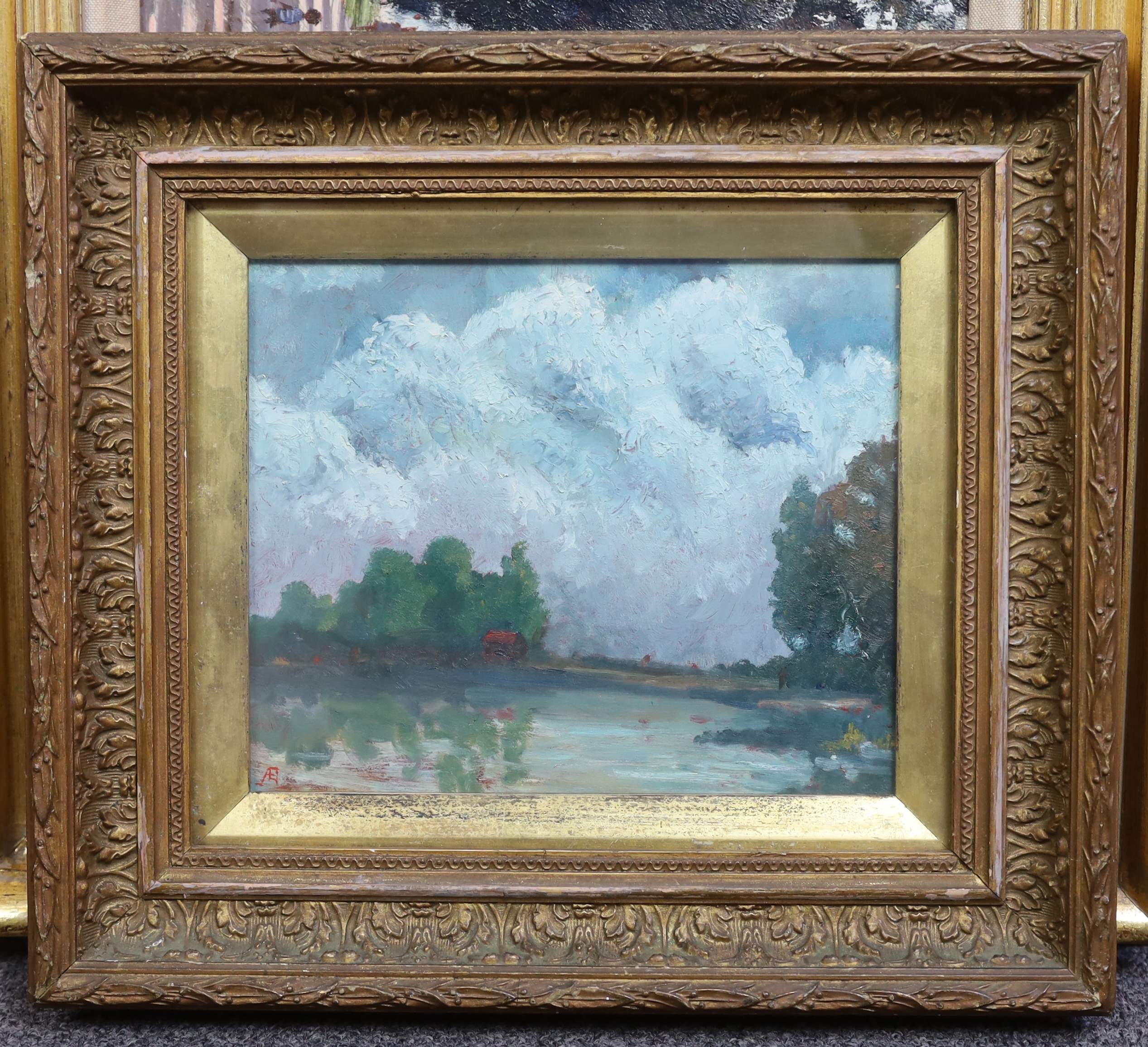 Attributed to George William Russell (Irish, 1867-1935), oil on card, Lake scene with cottage, monogrammed, 18 x 22cm. Condition - fair to good